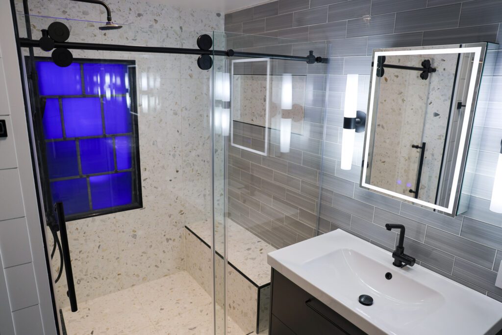 A modern remodeled bathroom by Goodridge Construction showcasing expert bathroom remodeling services. This project highlights the quality and craftsmanship found across all of our interior remodeling services, from detailed finishes to functional upgrades. Whether transforming bathrooms, enhancing living spaces, or elevating homes through our trusted kitchen remodeling services, Goodridge Construction delivers exceptional results built to last.