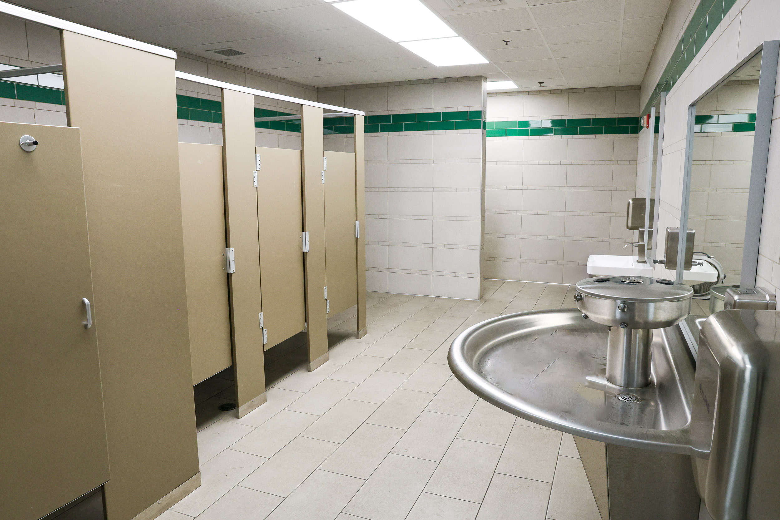 Newly installed commercial bathroom as part of Goodridge Construction Group's commercial interior fit-out services, featuring clean fixtures in commercial bathrooms and restrooms and custom kitchens and break rooms.
