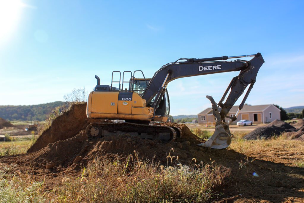 Residential Excavation Company, Foundation excavation and driveway excavation in progress as an excavator prepares the base of a new home, residential construction company showcasing precision, planning, and skilled site development work.